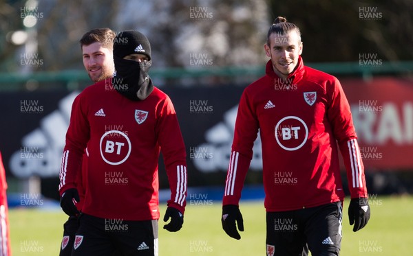 181119 - Wales Football Training Session - Aaron Ramsey of Wales goes in disguise alongside Gareth Bale during training ahead of their Euro 2020 Qualifier against Hungary
