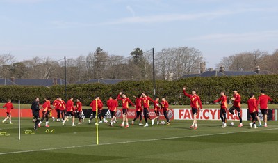 190325  Wales Men Football Training - The Wales squad warm up during a Wales training session ahead of the 2026 World Cup Qualifiers with Kazakhstan and North Macedonia