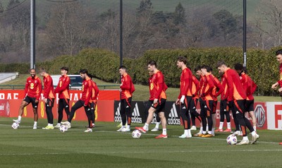 190325  Wales Men Football Training - The Wales squad warm up during a Wales training session ahead of the 2026 World Cup Qualifiers with Kazakhstan and North Macedonia