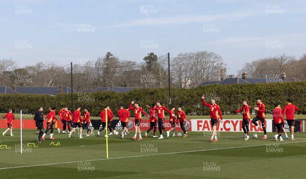 190325  Wales Men Football Training - The Wales squad warm up during a Wales training session ahead of the 2026 World Cup Qualifiers with Kazakhstan and North Macedonia