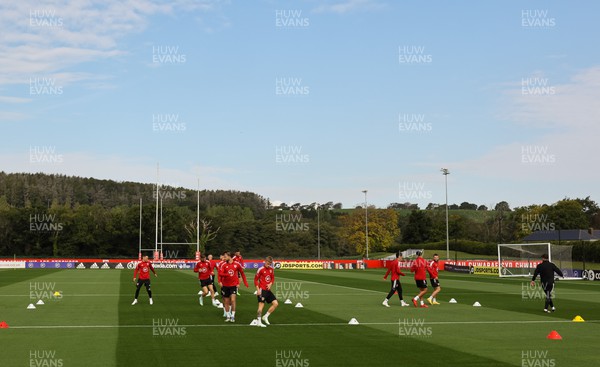 200922 - Wales Football training session - Members of the Wales squad warm up during training session ahead of their nations League matches against Belgium and Poland