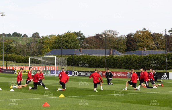 200922 - Wales Football training session - Wales squad member warm up during training session ahead of their nations League matches against Belgium and Poland