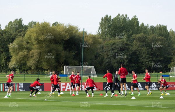 200922 - Wales Football training session - Wales squad member warm up during training session ahead of their nations League matches against Belgium and Poland