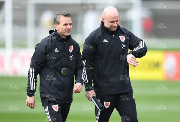 230321 - Wales Football Training - Robert Page and Albert Stuivenberg during training