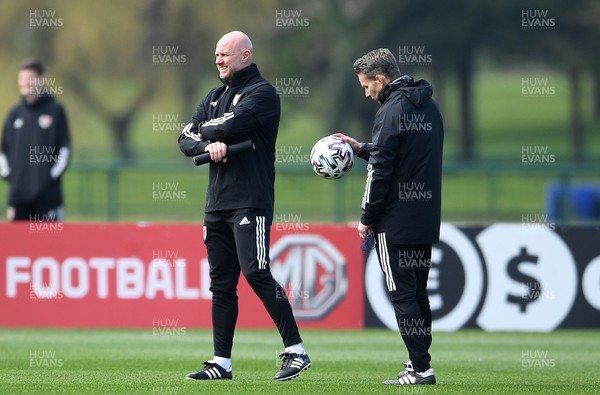 230321 - Wales Football Training - Robert Page and Albert Stuivenberg during training