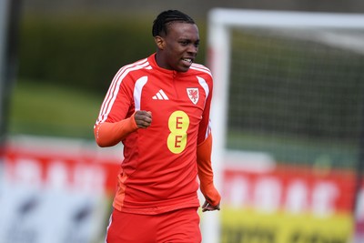 250326 - Wales Football Training - Ronan Kpakio of Wales during training ahead of their World Cup play-off match against Bosnia-Herzegovina