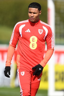 250326 - Wales Football Training - Kai Andrews of Wales during training ahead of their World Cup play-off match against Bosnia-Herzegovina