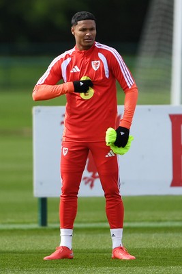 250326 - Wales Football Training - Kai Andrews of Wales during training ahead of their World Cup play-off match against Bosnia-Herzegovina