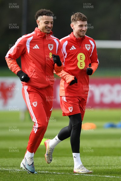 250326 - Wales Football Training - Ethan Ampadu and David Brooks of Wales during training ahead of their World Cup play-off match against Bosnia-Herzegovina