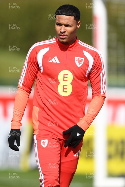 250326 - Wales Football Training - Kai Andrews of Wales during training ahead of their World Cup play-off match against Bosnia-Herzegovina
