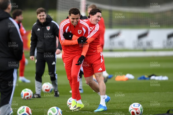 250326 - Wales Football Training - Brennan Johnson and Harry Wilson of Wales during training ahead of their World Cup play-off match against Bosnia-Herzegovina