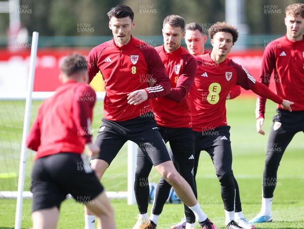 270323 - Wales Football Training session - Kieffer Moore, Aaron Ramsey and Ethan Ampadu during a training session ahead of the Euro Qualifying match against Latvia
