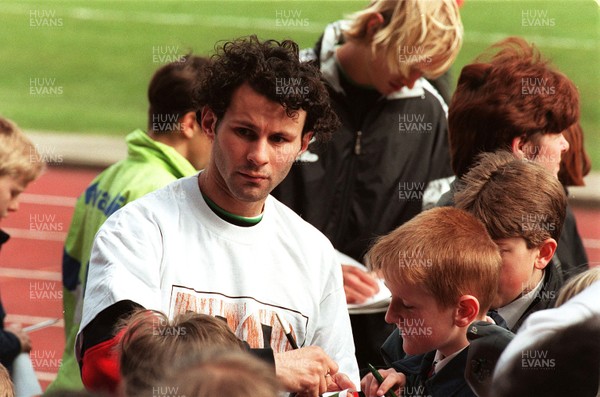 280397 - Wales Football Training - Ryan Giggs signs autographs