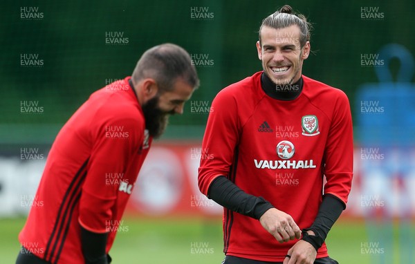 290817 - Wales Football Training - Joe Ledley and Gareth Bale during training