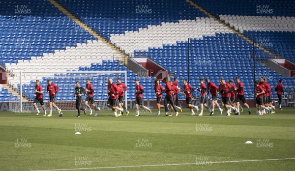 010917 - Wales Football Training Session - Wales team warm up ahead of the training session prior to the World Cup Qualifying match against Austria