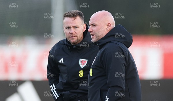 131123 - Wales Football Training Session -  Chris Gunter, left, with Wales manager Rob Page during a training session ahead of the Euro 2024 Qualifying matches against Armenia and Turkey