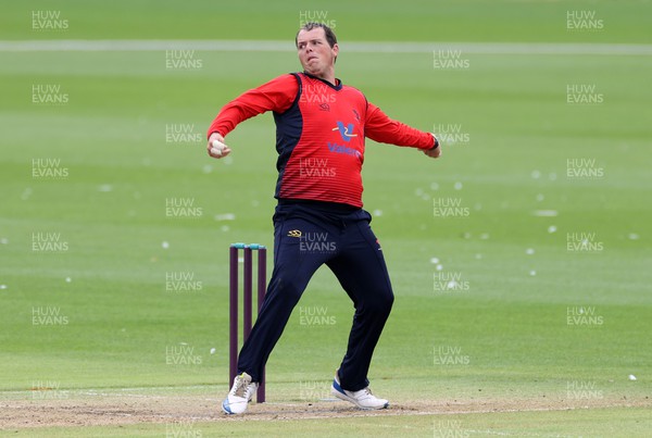 310722 - Wales National County v Glamorgan - One Day Tour Match - Bradley Wadlan of Wales bowling