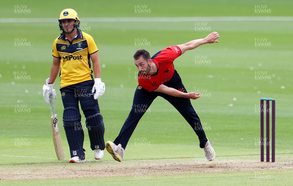 310722 - Wales National County v Glamorgan - One Day Tour Match - Richard Edwards of Wales bowling