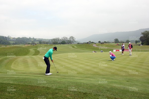 020612 -  ISPS Handa Wales Open Golf, Round 3, Celtic Manor, Newport - Chris Wood putts at the 4th green