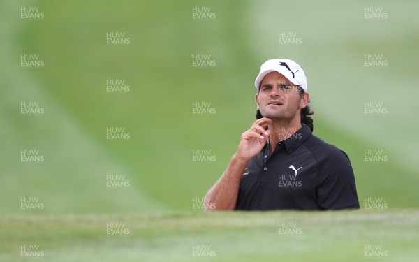 04.06.11 -SAAB Wales Open 2011, Celtic Manor Resort, Newport -  Johan Edfors checks the position of his shot on the 1st green 