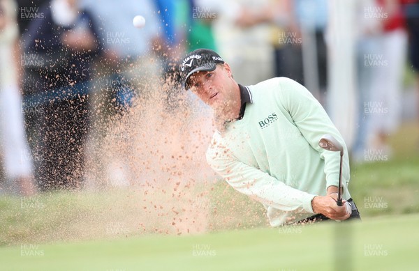 04.06.11 -SAAB Wales Open 2011, Celtic Manor Resort, Newport -  Alexander Noren plays out of ther bunker onto the 1st green 