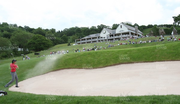 06.06.10.. Celtic Manor Wales Open 2010, Round 4 -  Ireland's Simon Thornton plays out of the bunker onto the 18th green 