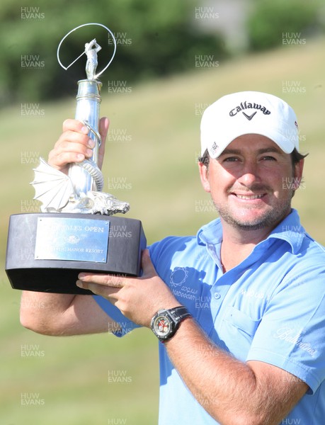 06.06.10.. Celtic Manor Wales Open 2010, Round 4 -  Wales Open 2010 winner Graeme McDowell with the Wales Open Trophy 