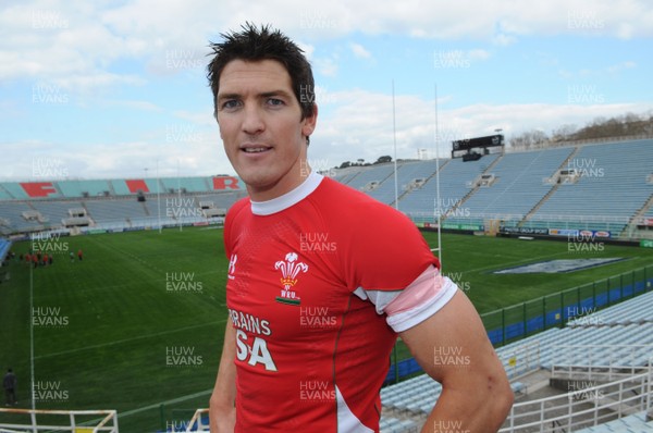 13.03.09 - Wales Rugby Training - Wales outside half James Hook shows off the pink armband which will be worn by all Wales players against Italy tomorrow. The armbands will be worn in support of the team analyst's wife, Katherine Bown and team photographer's wife, Sue Evans who are both fighting cancer. 