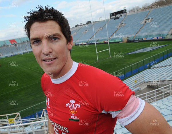 13.03.09 - Wales Rugby Training - Wales outside half James Hook shows off the pink armband which will be worn by all Wales players against Italy tomorrow. The armbands will be worn in support of the team analyst's wife, Katherine Bown and team photographer's wife, Sue Evans who are both fighting cancer. 