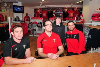 180412- Wales players signing- Jamie Roberts, Lou Reed and Huw Bennett signing autographs at the Cardiff Arms Shop