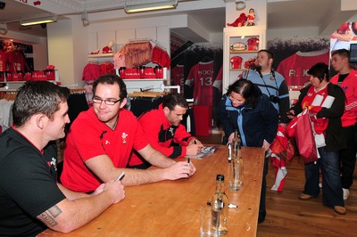 180412- Wales players signing- Jamie Roberts, Lou Reed and Huw Bennett signing autographs at the Cardiff Arms Shop