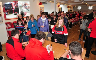 180412- Wales players signing- Jamie Roberts, Lou Reed and Huw Bennett signing autographs at the Cardiff Arms Shop