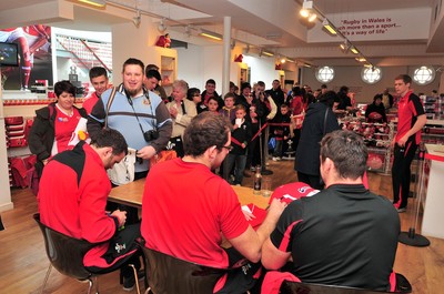 180412- Wales players signing- Jamie Roberts, Lou Reed and Huw Bennett signing autographs at the Cardiff Arms Shop