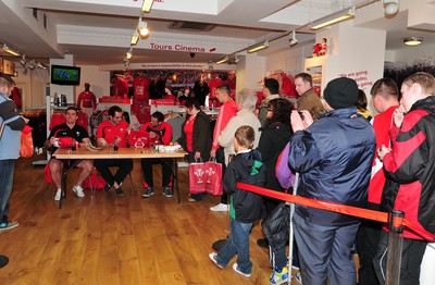 180412- Wales players signing- Jamie Roberts, Lou Reed and Huw Bennett signing autographs at the Cardiff Arms Shop