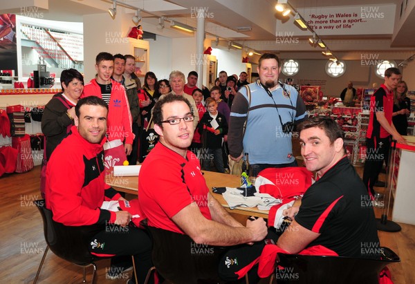 180412- Wales players signing- Jamie Roberts, Lou Reed and Huw Bennett signing autographs at the Cardiff Arms Shop