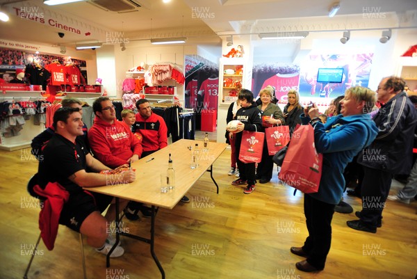 180412- Wales players signing- Jamie Roberts, Lou Reed and Huw Bennett signing autographs at the Cardiff Arms Shop