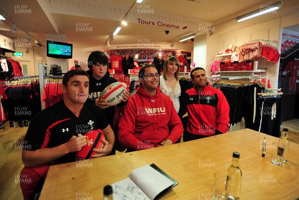 180412- Wales players signing- Jamie Roberts, Lou Reed and Huw Bennett signing autographs at the Cardiff Arms Shop
