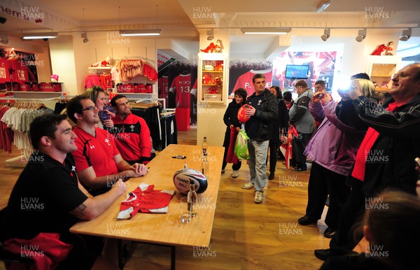 180412- Wales players signing- Jamie Roberts, Lou Reed and Huw Bennett signing autographs at the Cardiff Arms Shop