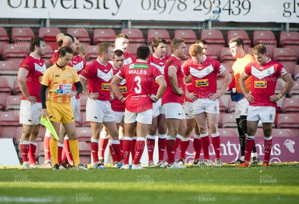 251012 -  Wales v England - Rugby League -     The Wales players are dejected after being heavily defeated by England  