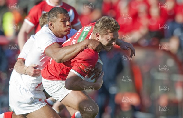 251012 -  Wales v England - Rugby League -     Christian Roets of Wales, right, is tackled by Callum Watkins of England  