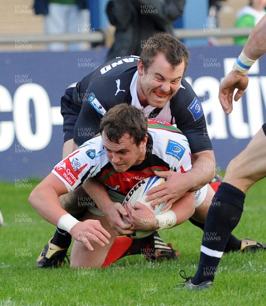 08.11.09 - rugbyleague.com European Cup Final, Wales v Scotland Wales' Ashley Bateman scores a try as Scotland's Kevin Henderson tackles 