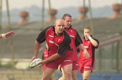 040601  - Wales Rugby Training - Craig Quinnell passes during training in Osaka