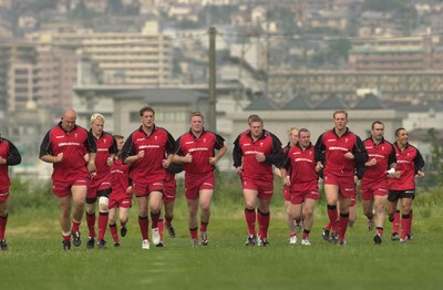 040601  - Wales Rugby Training - The team for Wednesday's game run out in Osaka
