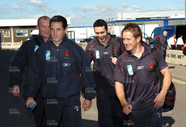 04.09.07 - Wales Rugby Welsh rugby squad members Martyn Williams, Gareth Cooper, Stephen Jones and Shane Williams arrive at Cardiff Airport on their way to compete in the Rugby World Cup in France 