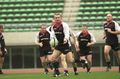 050601 - Wales Rugby Training - Fly half Lee Jarvis sets up the backs in training in Osaka