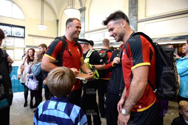 100815 - Wales Rugby Squad Travel to Colwyn Bay -Jamie Roberts and Mike Phillips meets fans as they arrive at Cardiff Central Station for the squads train to Colwyn Bay