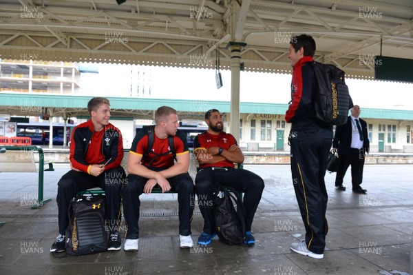 100815 - Wales Rugby Squad Travel to Colwyn Bay -Tyler Morgan, Jack Dixon, Taulupe Faletau and James Hook wait for their train to Colwyn Bay at Cardiff Central Station