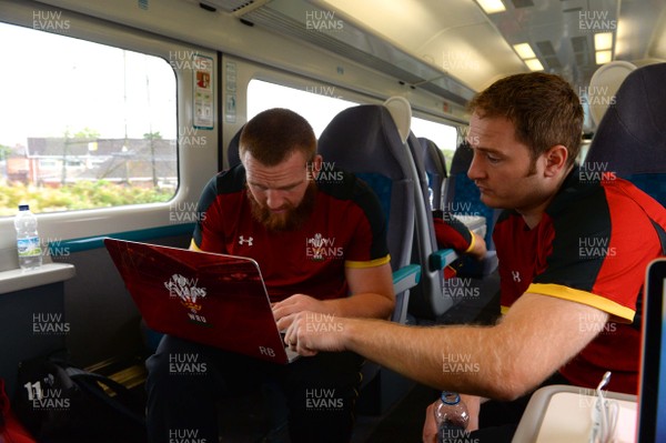 100815 - Wales Rugby Squad Travel to Colwyn Bay -Jake Ball and Rhodri Bown on the Wales squad train to Colwyn Bay from Cardiff Central Station