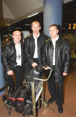 130203 - Wales Rugby - (L-R) Gareth Williams, Gareth Thomas and Leigh Davies arrive at Rome Airport