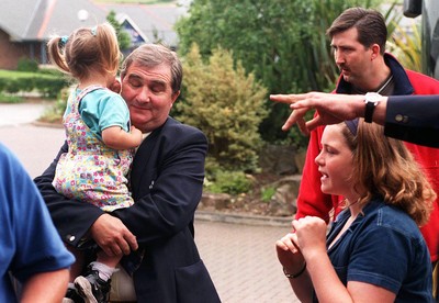 290698 - Wales Rugby team arrive home -  Dennis John with granddaughter Katie 